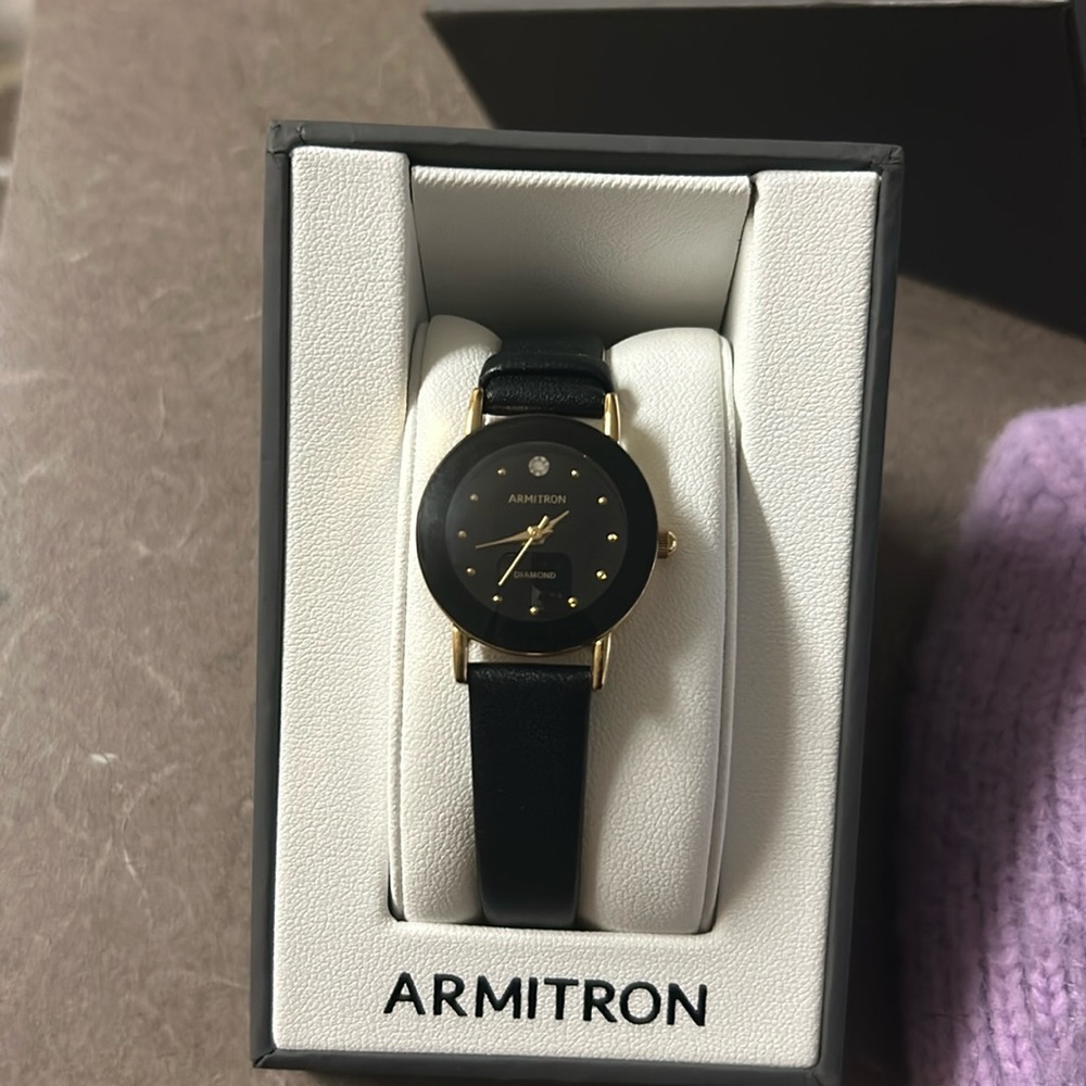 Black and gold watch